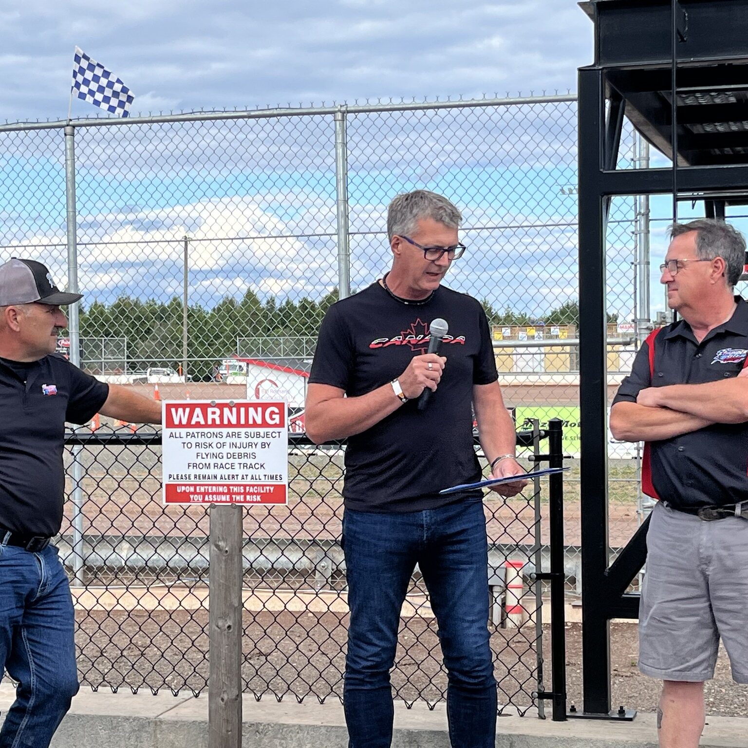 MPP Kevin Holland at Thunder Valley Speedway, announcing NOHFC funding. The setting of the speedway adds an energetic and community-focused atmosphere to the announcement, reflecting the excitement and potential impact of this new investment.