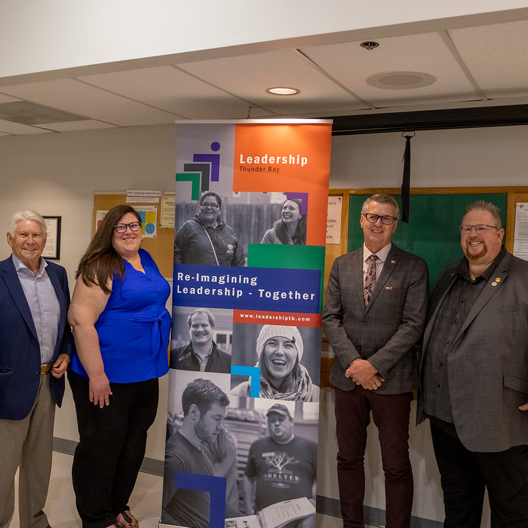 A group photograph of all speakers at the OTF leadership grant announcement, including notable figures like MPP Kevin Holland and Mayor Ken Boshcoff. The picture symbolizes unity and collaboration among community leaders in their pursuit of enhancing leadership and development opportunities.