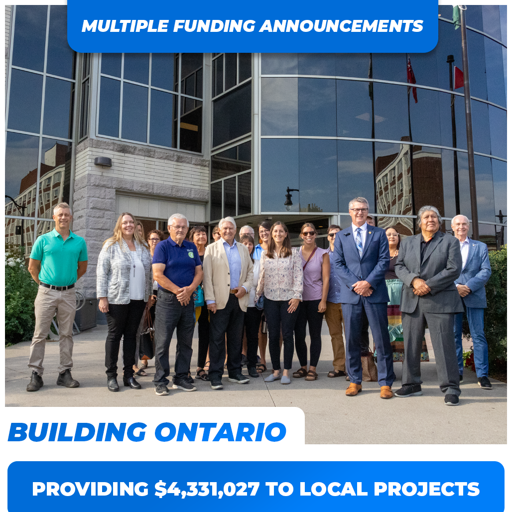 Featured image of a diverse assembly in front of city hall for the NOHFC funding announcement, with the overlay text 'Multiple Funding Announcements.' The photograph underscores the wide-reaching benefits of the funding across different community sectors and groups.
