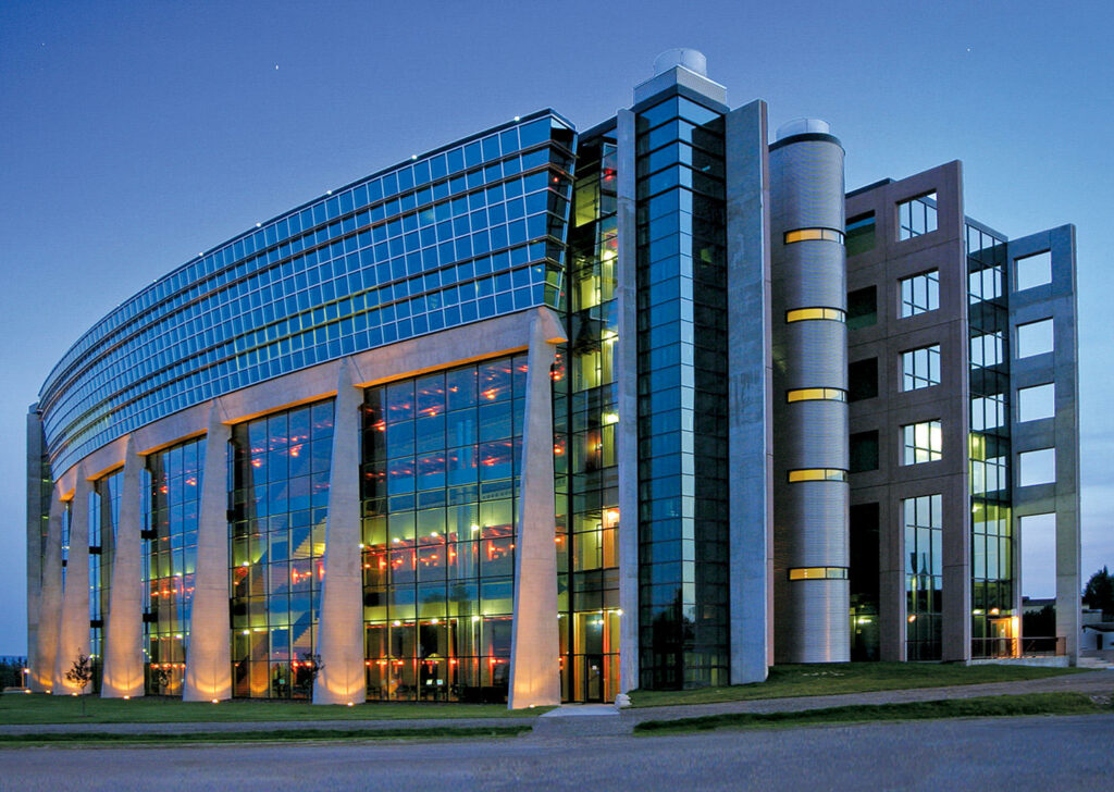 "Image of the main building at Lakehead University, a modern and imposing structure symbolizing academic excellence. The photo is associated with the recent news of a $140,000 innovation investment from the Ontario government, highlighting the university's commitment to pioneering research and educational advancement.