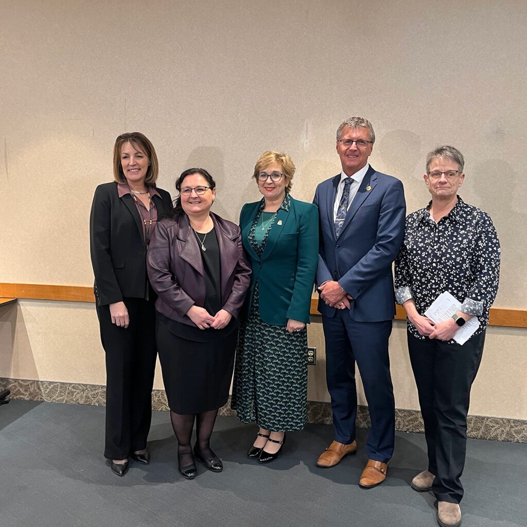 A photo of PA Robin Martin, MPP Kevin Holland, the CEO of Thunder Bay Regional, and other staff standing together for a picture after an announcement.